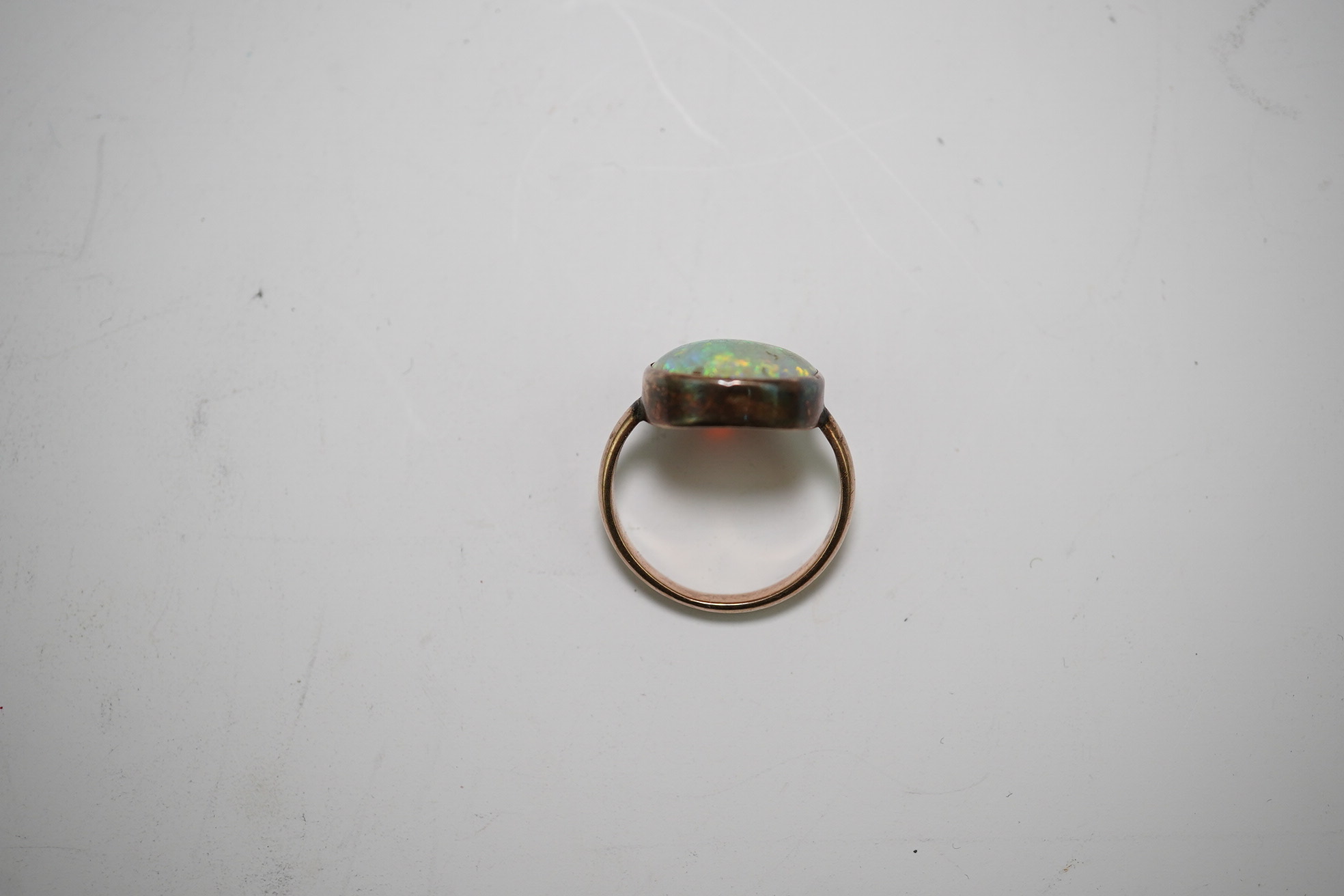 A 9ct gold opal dress ring, size J, gross weight 4.1 grams.